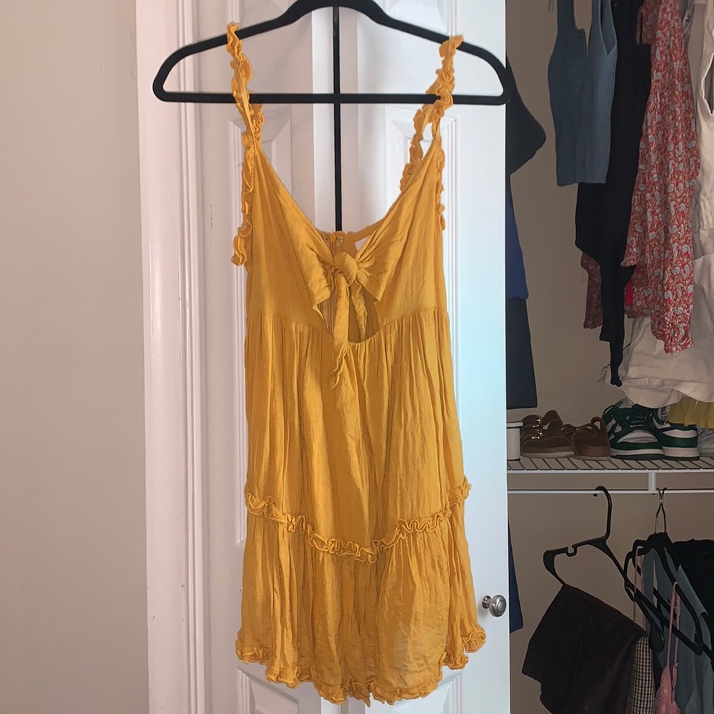 Great condition worn once Mustard yellow/orange ruffle dress size M
